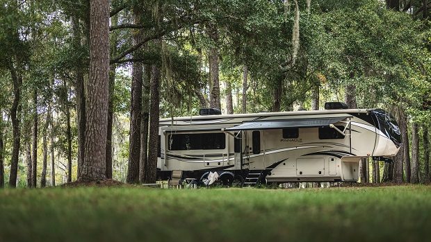 Jayco Pinnacle 5th wheel in forest