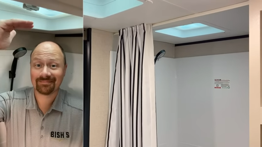 Josh the RV Nerd demonstrates headroom in the Go Play 26BHS shower