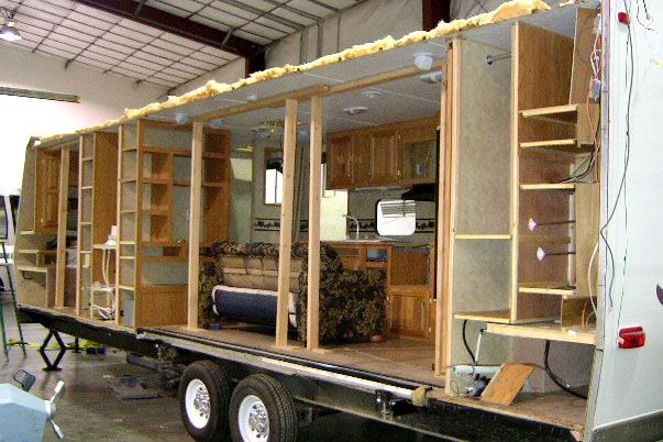 travel trailer with side wall removed. See inside the trailer.