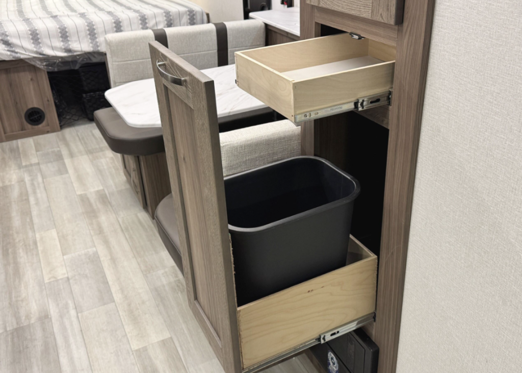 Built-in trashcan storage. 