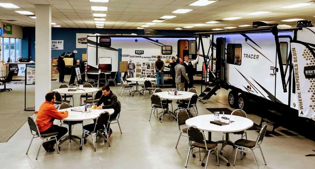 Bish's RV at an RV show inside a building