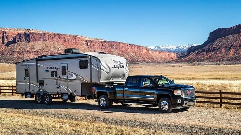GMC truck pulling a Jayco Eagle 5th wheel in Utah mountains

