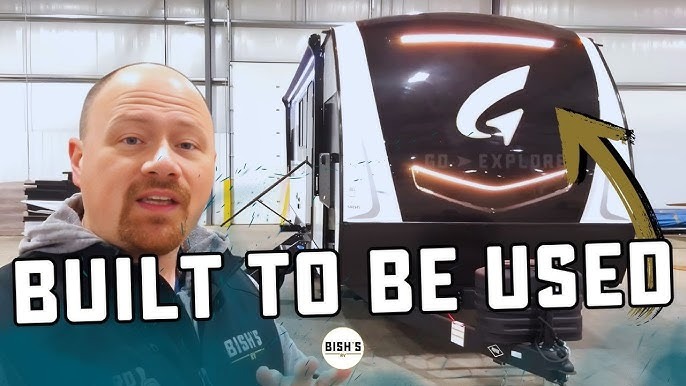 Josh the RV Nerd iwth a Go Explore Travel Trailer
