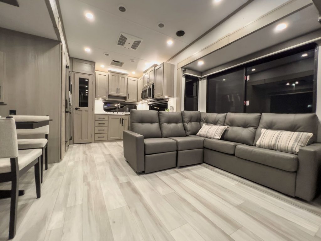 living area, including large L-shaped sofa inside Influence 3203GK