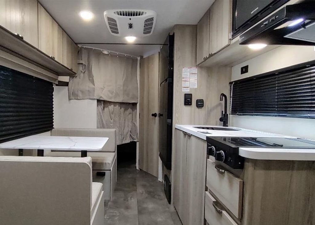 Kitchen inside Forest River Wildwood FSX 179DBK