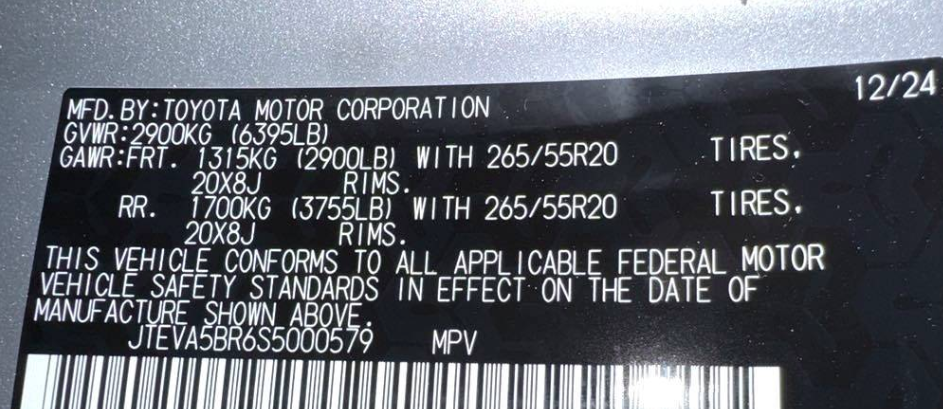 Toyota vehicle door-jamb label showing GVWR, front and rear GAWR, tire size specifications (265/55R20), rim details, VIN number, and federal safety compliance information.