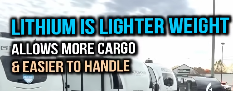 Screenshot showing travel trailers at an RV dealership with bold text stating that lithium batteries are lighter, allow more cargo capacity, and are easier to handle.