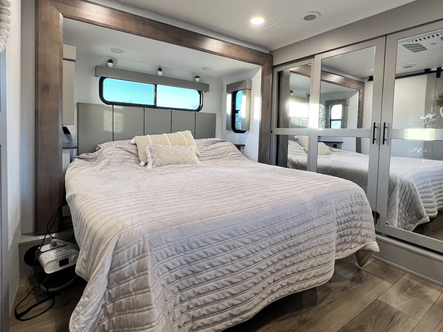 Master bedroom with large spacious area in the RV.