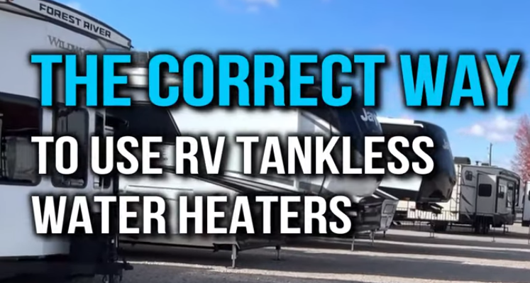 How to use RV tankless water heaters correctly, shown with fifth wheel and travel trailers at an RV dealership