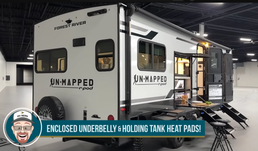 Forest River Unmapped r-pod travel trailer with rear kitchen hatch open and outdoor cooking area