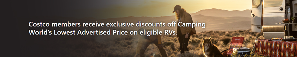 Family camping beside an RV at sunset with dog and outdoor gear