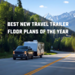 Pickup truck towing a travel trailer on a scenic mountain highway with text reading “Best New Travel Trailer Floor Plans of the Year