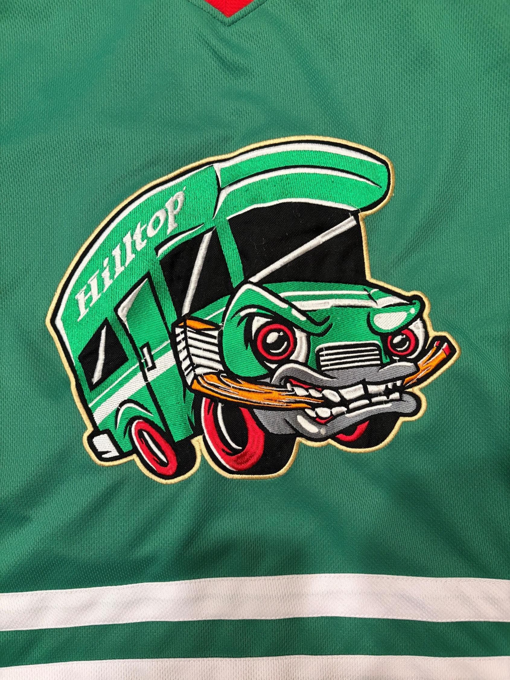 Hilltop Hockey Club logo featuring an RV-themed hockey mascot.
