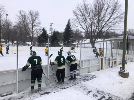 Hilltop Hockey Club playing an outdoor hockey game during the 2026 season.