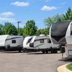RV shopping near Metro Detroit with campers lined up at a Michigan dealership